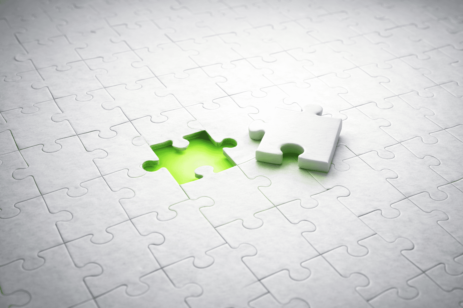 Puzzle board with a highlighted missing piece